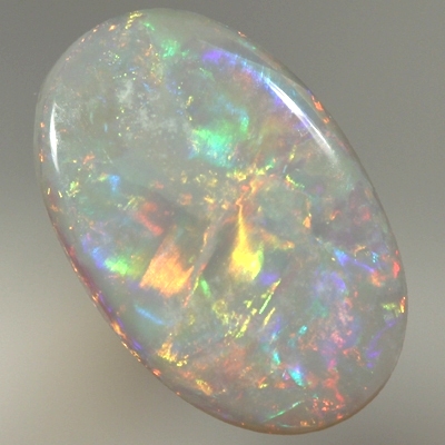 SOLID SEMI BLACK OPAL Bright rolling flashes, red, neon yellow and green